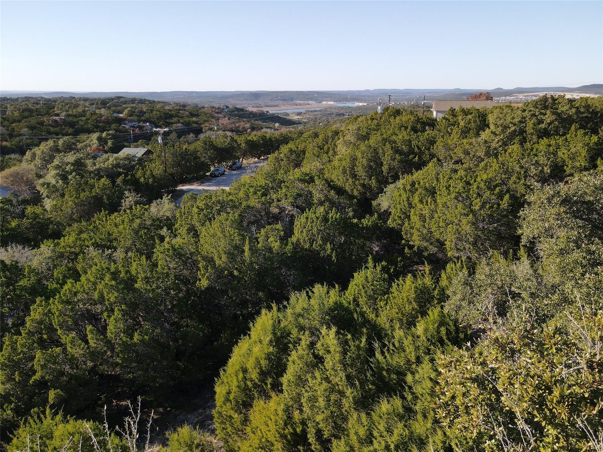 View 6408 Lohmans Ford Rd in Lago Vista Sec 02 6408 Lohmans Ford Rd - front exterior - Luxury home in Lago Vista Sec 02, Lago Vista, TX