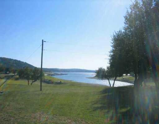 View 6713 Bar K Ranch RD 6713 Bar K Ranch RD - front exterior - Luxury lot in Lago Vista, TX