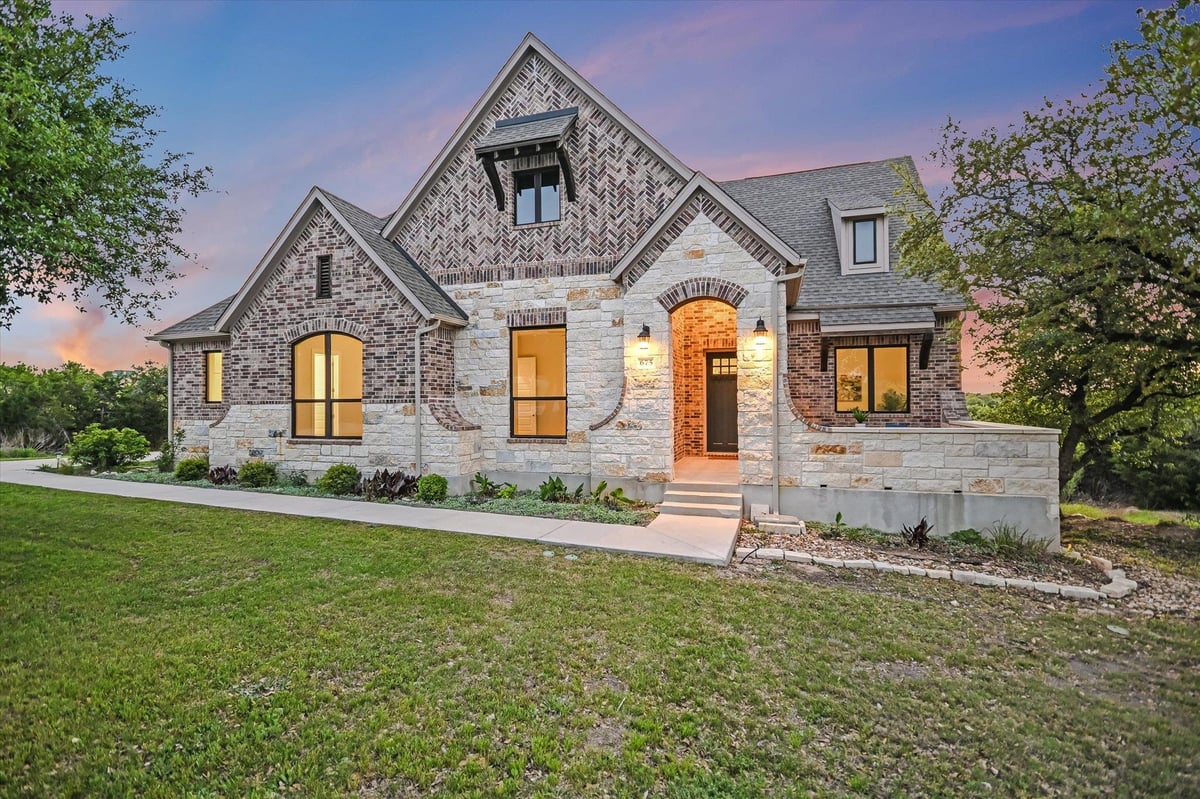 View 675 Spectacular Bid Dr in Saratoga Hills 675 Spectacular Bid Dr - front exterior - Luxury home in Saratoga Hills, Austin, TX