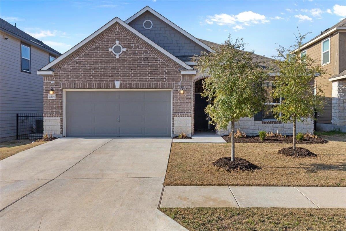 View 6909 Daniel Ranch DR in McKinney Crossing 6909 Daniel Ranch DR - front exterior - Luxury home in McKinney Crossing, Austin, TX