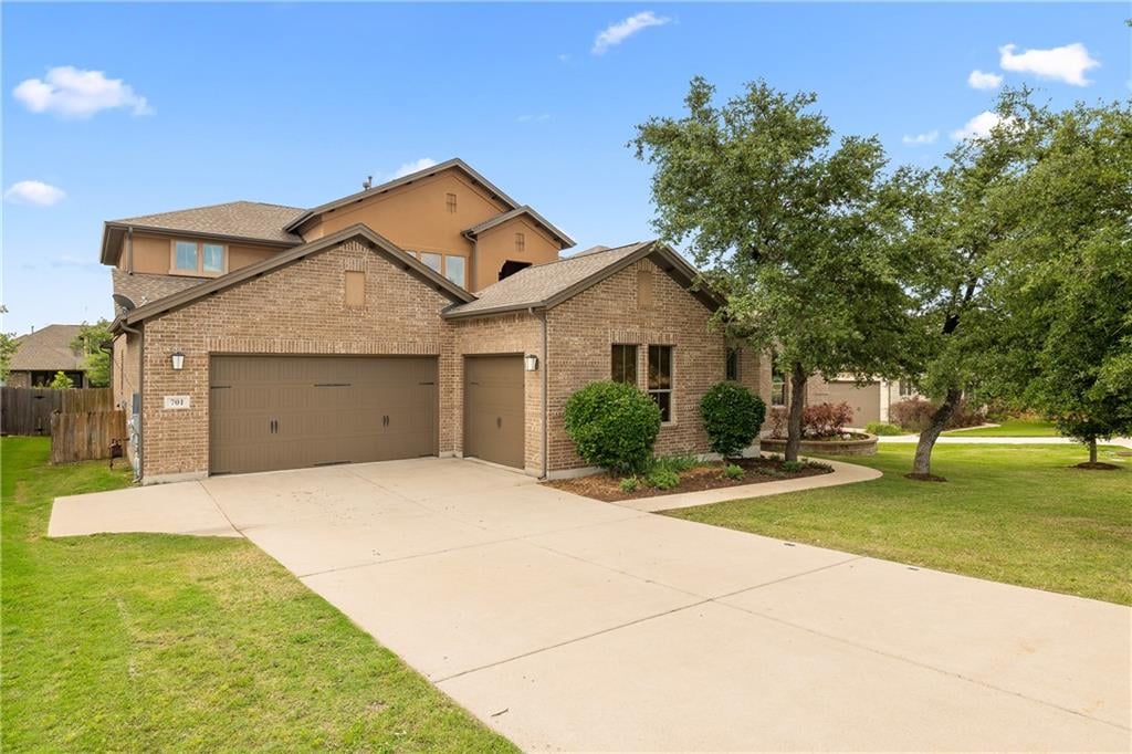 View 701 Naples Ln in Belterra Ph 4 Sec 18 701 Naples Ln - front exterior - Luxury home in Belterra Ph 4 Sec 18, Austin, TX