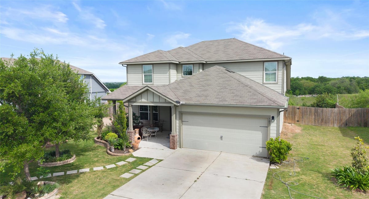 View 707 Liard River Rd in Riverwalk Ph 3 Sec 3 707 Liard River Rd - front exterior - Luxury home in Riverwalk Ph 3 Sec 3, Hutto, TX
