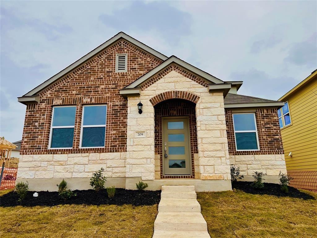 View 709 Long Run in Stonewall Ranch 709 Long Run - front exterior - Luxury home in Stonewall Ranch, Liberty Hill, TX