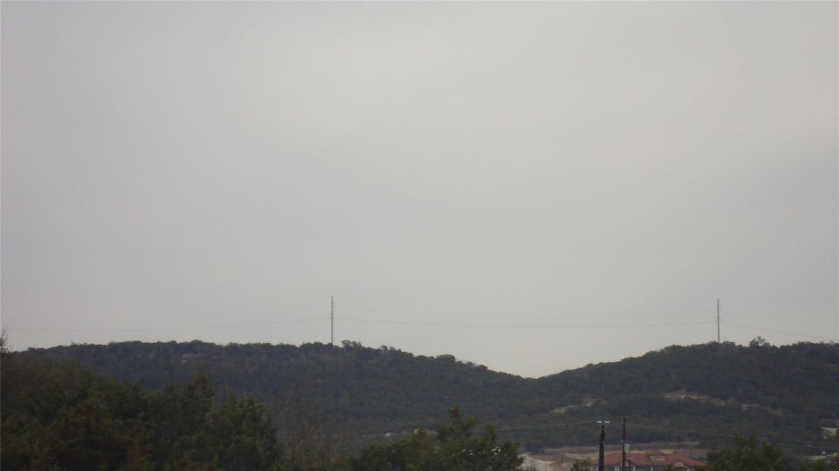 View 7700 Bar-K Ranch Rd in Bar-K Ranches 08 7700 Bar-K Ranch Rd - front exterior - Luxury lot in Bar-K Ranches 08, Lago Vista, TX