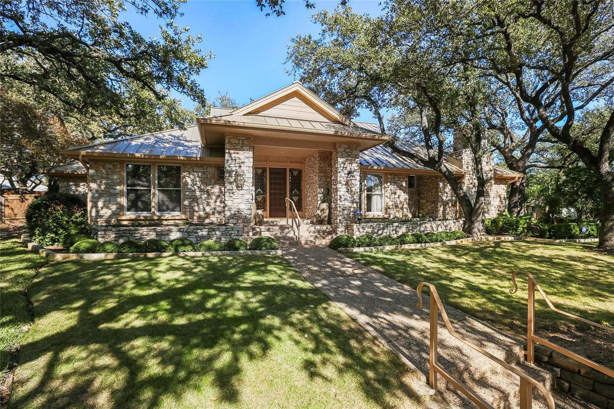 View 7702 Pleasant Meadow Cir in Green Trails Estates Resub 7702 Pleasant Meadow Cir - front exterior - Luxury home in Green Trails Estates Resub, Austin, TX