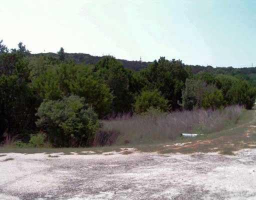 View 7704 Dogie Cv 7704 Dogie Cv - front exterior - Luxury lot in Lago Vista, TX