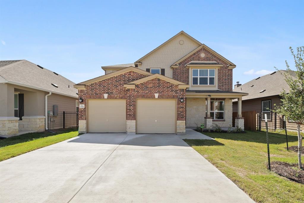 View 7711 Libretto Ln in McKinney Crossing 7711 Libretto Ln - front exterior - Luxury home in McKinney Crossing, Austin, TX