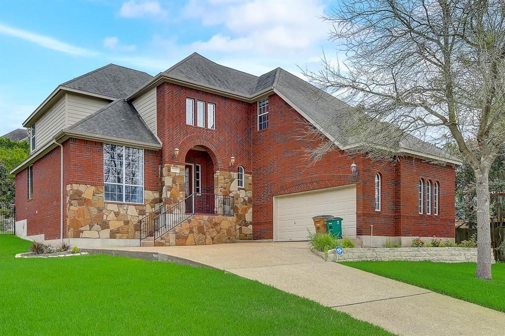 View 7715 Crackling Creek Dr in Covered Bridge Sec 05 7715 Crackling Creek Dr - front exterior - Luxury home in Covered Bridge Sec 05, Austin, TX