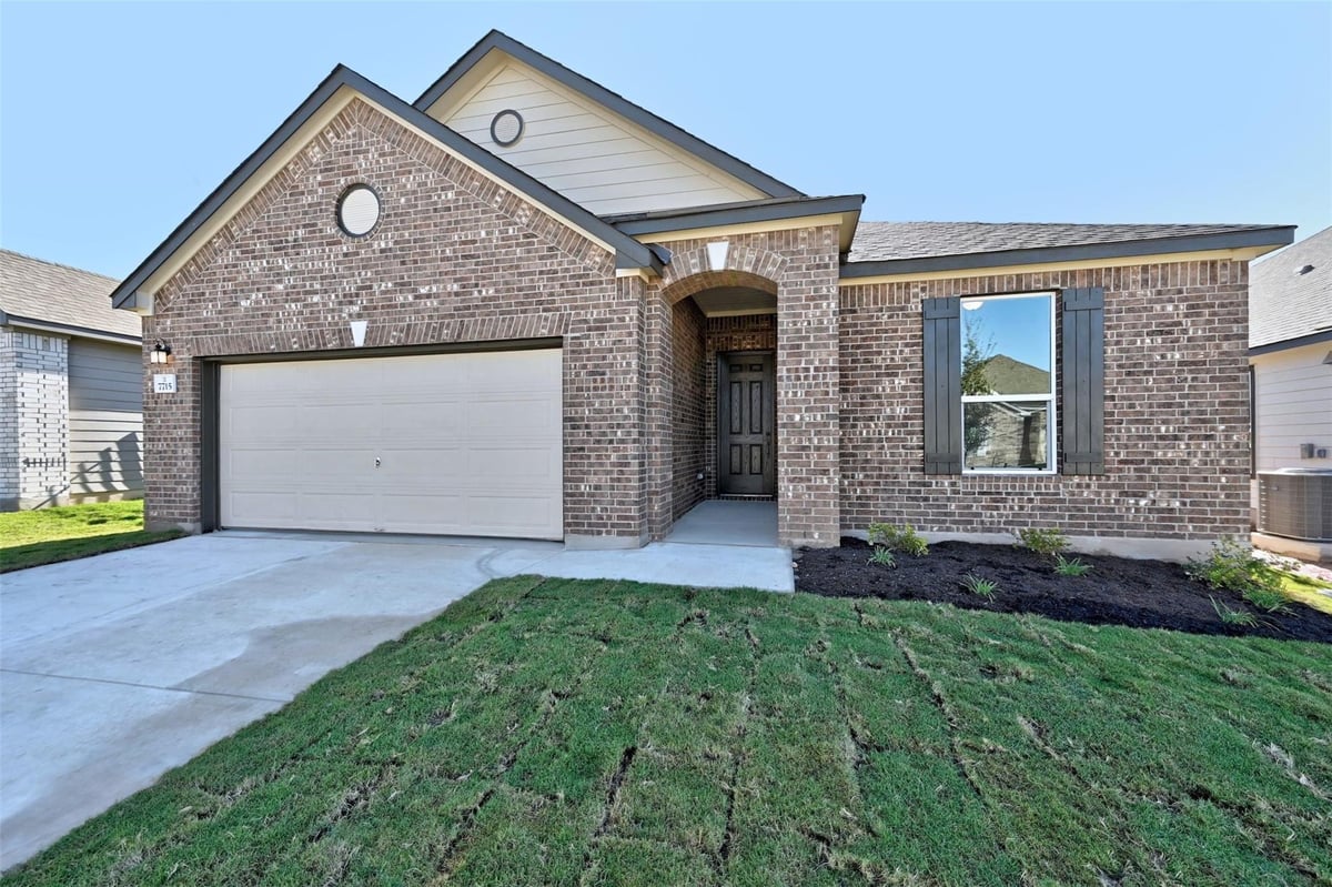 View 7715 Douvaine Dr in McKinney Crossing 7715 Douvaine Dr - front exterior - Luxury home in McKinney Crossing, Austin, TX