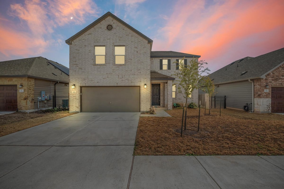 View 7715 Libretto Ln in McKinney Crossing 7715 Libretto Ln - front exterior - Luxury home in McKinney Crossing, Austin, TX