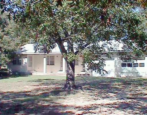 View 7801 FM 1105 7801 FM 1105 - front exterior - Luxury home in Georgetown, TX