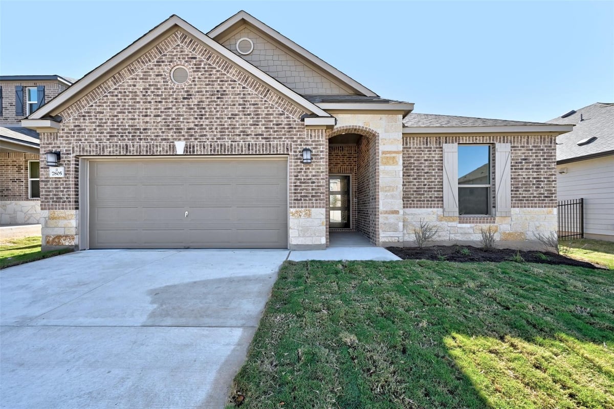View 7805 Douvaine Dr in McKinney Crossing 7805 Douvaine Dr - front exterior - Luxury home in McKinney Crossing, Austin, TX