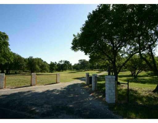 View 800 County Road 266 800 County Road 266 - front exterior - Luxury home in Georgetown, TX
