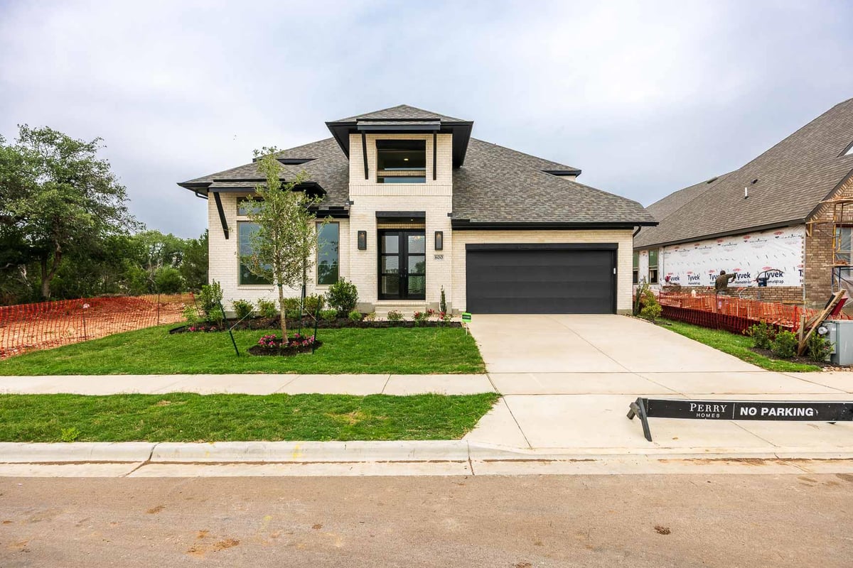 View 800 High Summit DR in Wolf Ranch 800 High Summit DR - front exterior - Luxury home in Wolf Ranch, Georgetown, TX