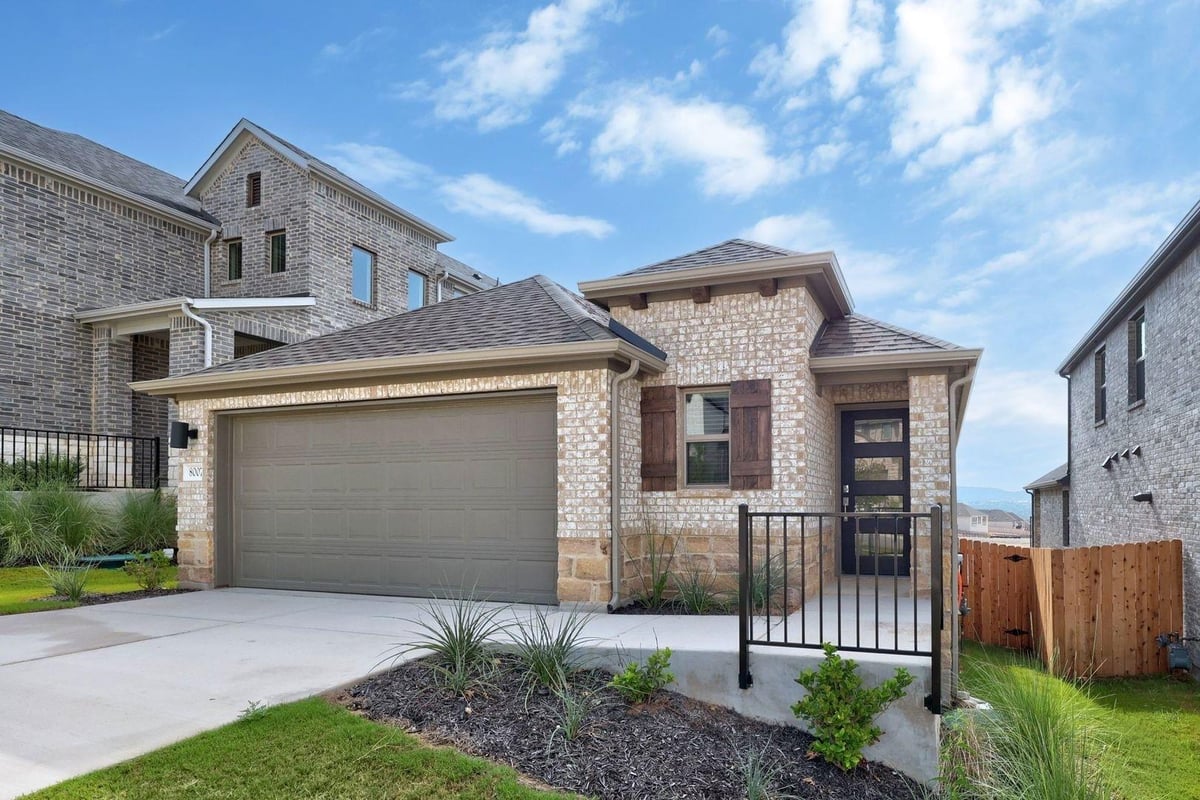 View 8007 Shining Flor Ln in Lakeside at Tessera 8007 Shining Flor Ln - front exterior - Luxury home in Lakeside at Tessera, Lago Vista, TX