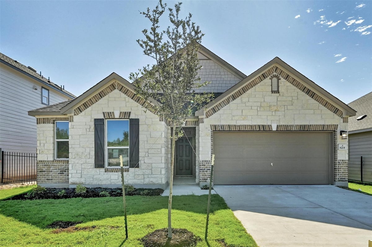 View 8201 Tranquil Glade Trl in McKinney Crossing 8201 Tranquil Glade Trl - front exterior - Luxury home in McKinney Crossing, Austin, TX