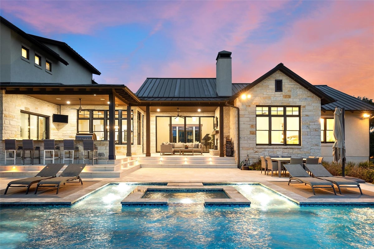 View 831 Polo Club Dr in The Polo Club At Rooster Spgs Ph 4 831 Polo Club Dr - front exterior with 831 Polo Club Dr in Austin - Luxury home in The Polo Club At Rooster Spgs Ph 4, Aus...