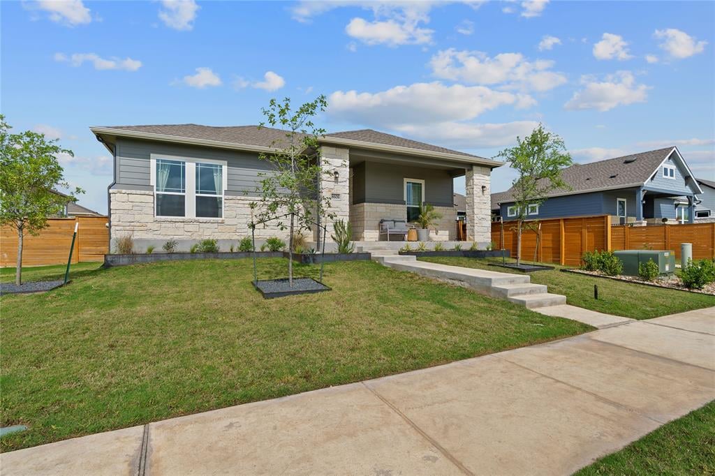 View 8608 Apogee Blvd in Easton Park 8608 Apogee Blvd - front exterior - Luxury home in Easton Park, Austin, TX