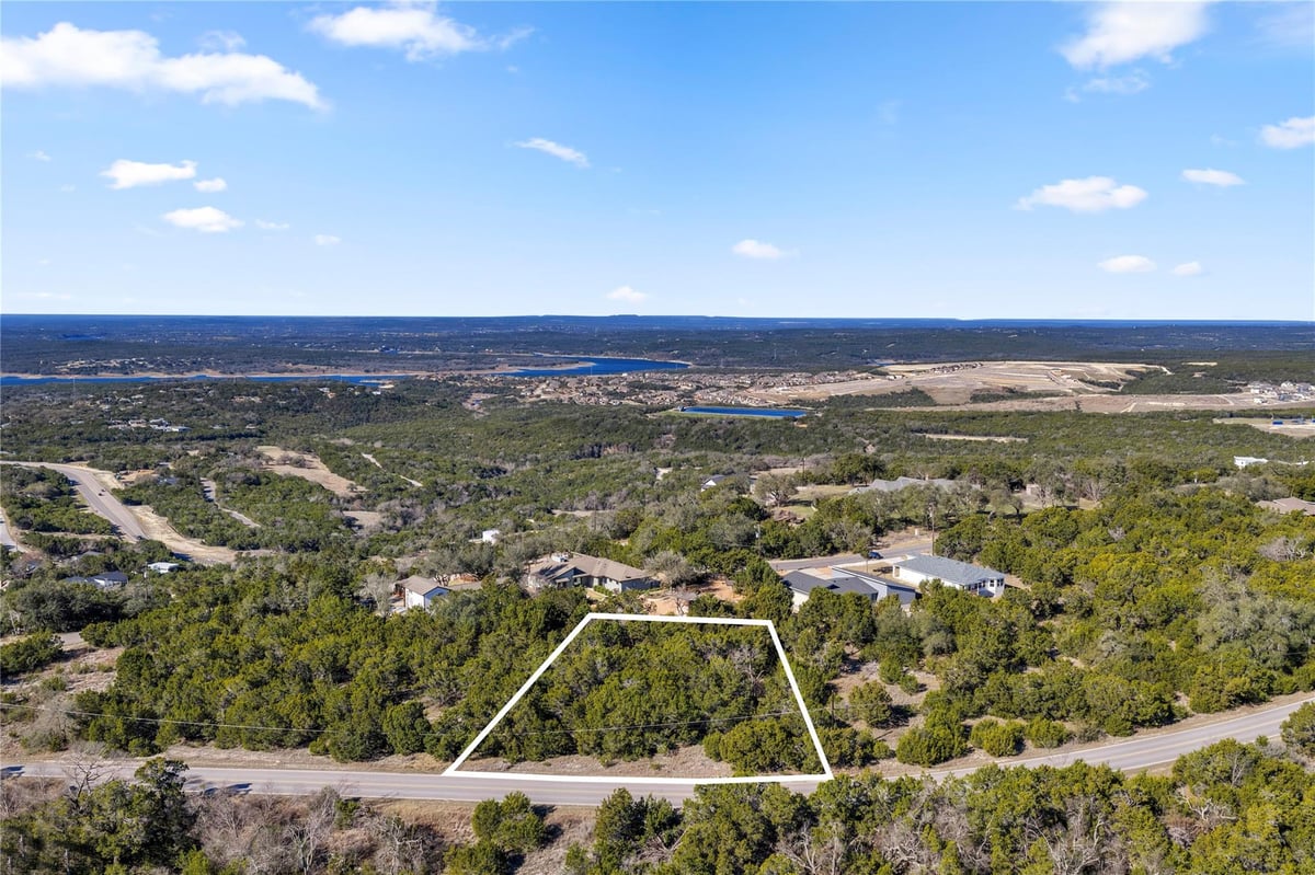 View 8614 Bar K Ranch Rd in Bar-K Ranches 12 8614 Bar K Ranch Rd - front exterior - Luxury lot in Bar-K Ranches 12, Lago Vista, TX
