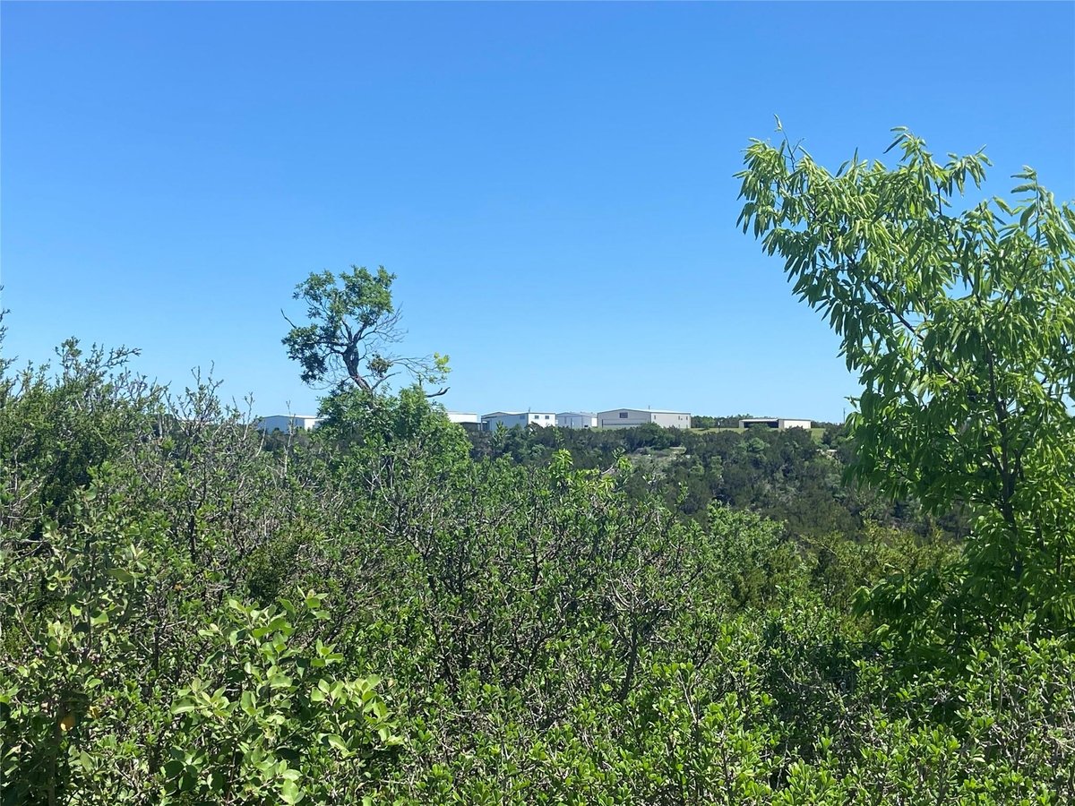 View 8617 Bar-K Ranch Rd in Bar-K Ranches 13 8617 Bar-K Ranch Rd - front exterior - Luxury lot in Bar-K Ranches 13, Lago Vista, TX