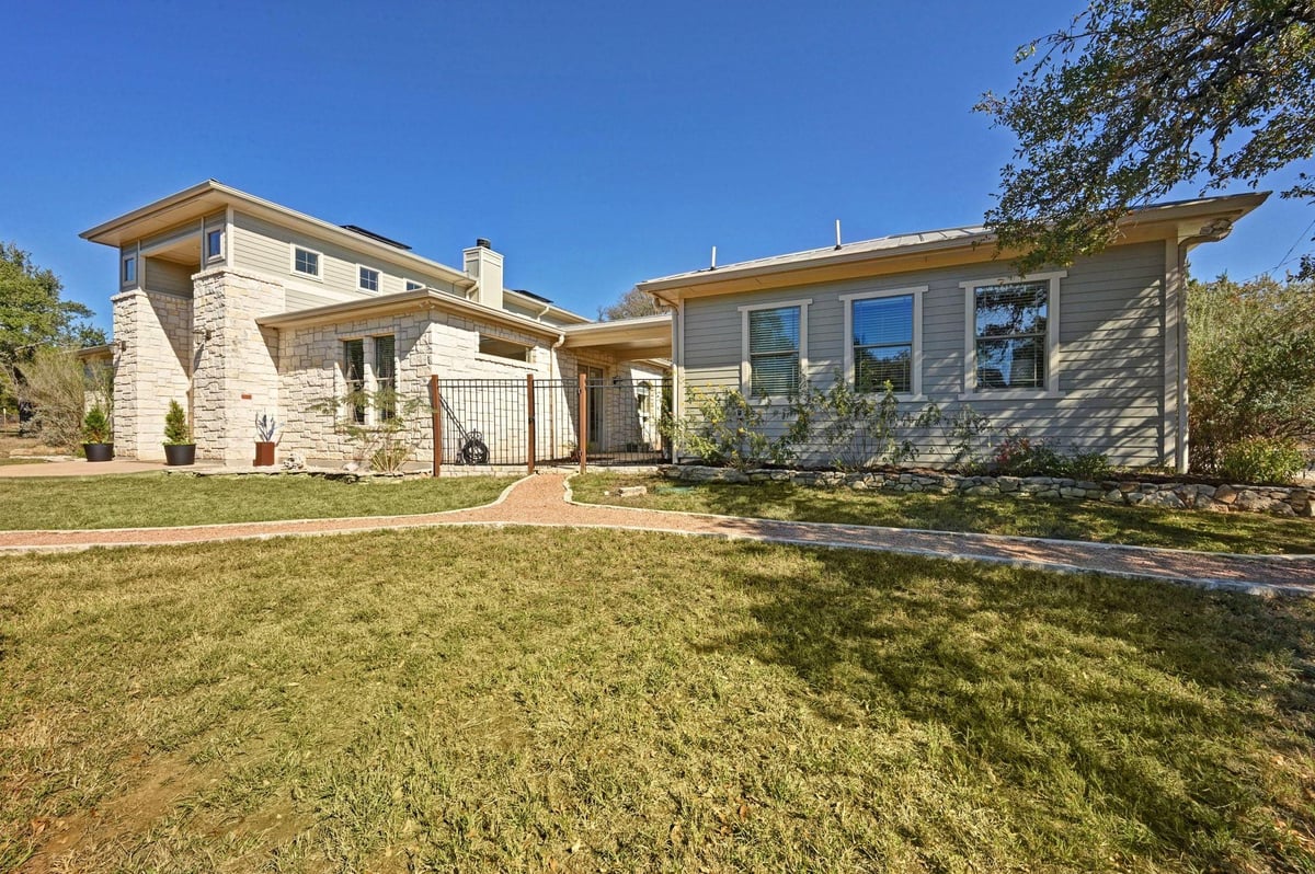 View 9300 N Madrone Trl in Bear Creek Oaks Sec 3 9300 N Madrone Trl - front exterior - Luxury home in Bear Creek Oaks Sec 3, Austin, TX