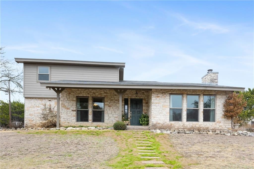 View 9400 Sandstone St in wynrock 9400 Sandstone St - front exterior - Luxury home in wynrock, Austin, TX