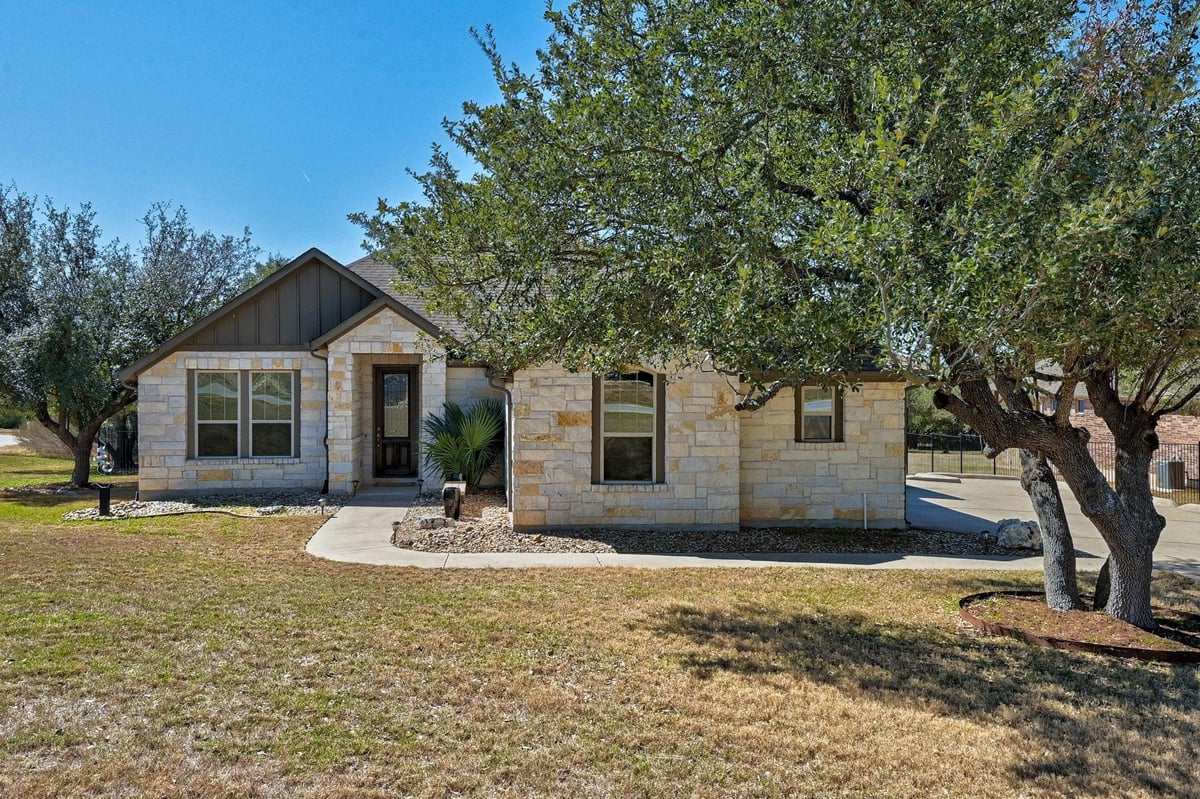 View 960 Blue Ridge Dr in Counts Estates Ph Two Aka Butler Ranch Estates 960 Blue Ridge Dr - front exterior - Luxury home in Counts Estates Ph Two Aka Butler Ranch Estates, Dripping Springs, TX