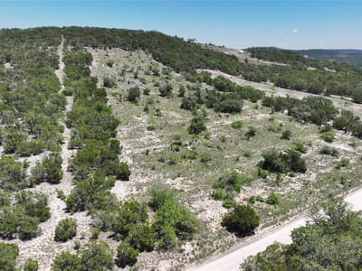 Primary bedroom at 10644 Deer Canyon Rd - Panoramic Hills Rev Of A P, Jonestown, TX