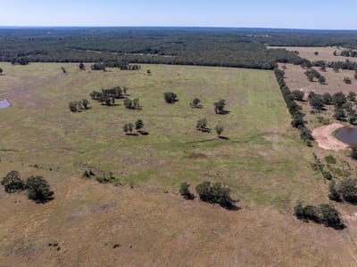 Primary bedroom at 1078 Old Pin Oak Rd Unit #Tract 2 - Holderman, Paige, TX