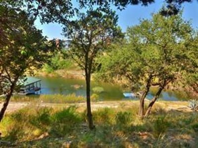 Primary bedroom at 1209 Osprey Ridge Loop - Waterford On Lake Travis Sec 02, Lago Vista, TX