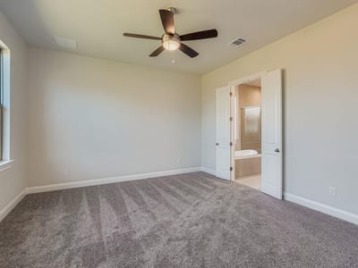 Primary bedroom at 121 Prickly Poppy Loop - 4 bed 3 bath home