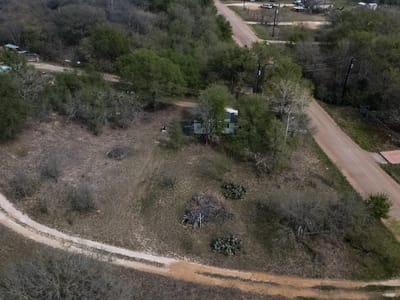 Primary bedroom at 128 Arrowhead Ct Unit #A - Colorado Shores Ltd, Bastrop, TX
