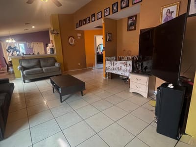 Primary bedroom at 12900 John Adams St - 3 bed 2 bath home