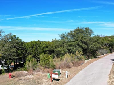 Primary bedroom at 18849 Hidden Ridge Pl - The Hollows on Lake Travis, Jonestown, TX