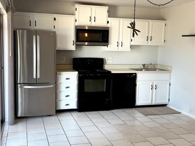 Living area at 1919 American DR Unit #123 - 1 bed 2 bath home