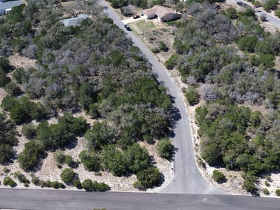 Primary bedroom at 21501 Santa Elena Cir - Highland Lake Estates Sec 26 A, Lago Vista, TX