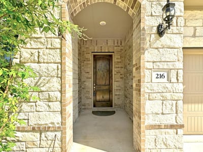 Primary bedroom at 216 Tovas Secret Cv - 5 bed 3 bath home