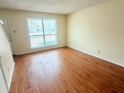 Primary bedroom at 3009 Whisper Oaks LN Unit #F - 2 bed 1 bath home