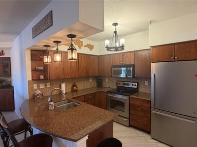 Living area at 3404 American Dr Unit #3118 - 2 bed 2 bath home