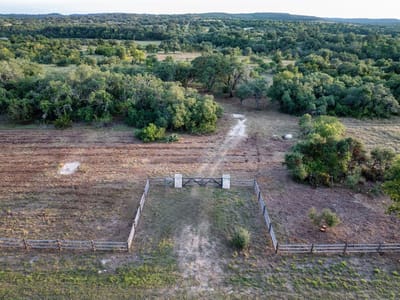 Primary bedroom at 7275 Creek Rd - William Haggard League, Dripping Springs, TX