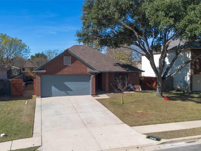 Primary bedroom at 7516 Cats Eye Ln - 3 bed 2 bath home