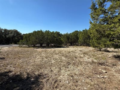 Primary bedroom at 7602 Sagebrush Trl - Bar-K Ranches 08, Lago Vista, TX