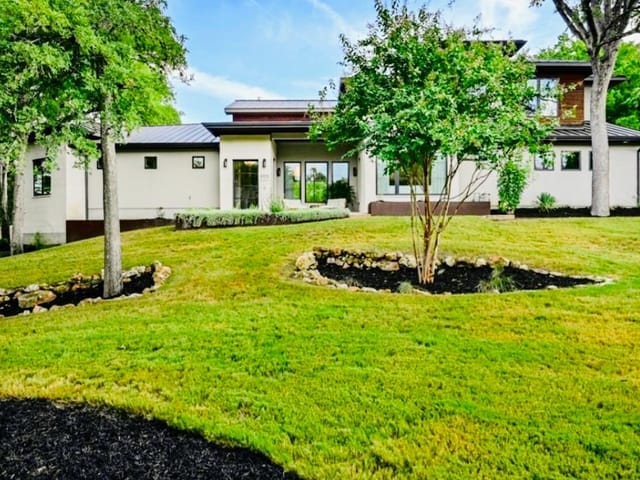 5103 ROLLINGWOOD Dr - front exterior - Luxury home in ROLLINGWOOD WESTLAKE Henry P Hill League, Rollingwood, TX