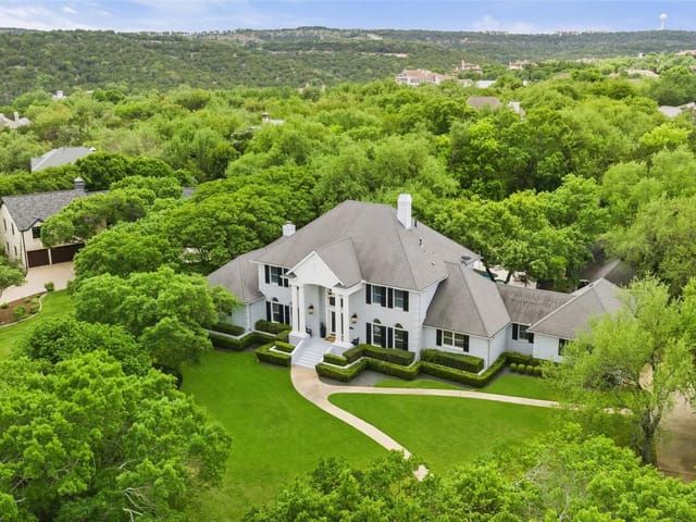 View 7609 Sandia Loop in Foothills Barton Creek 7609 Sandia Loop - front exterior - Luxury home in Foothills Barton Creek, Austin, TX