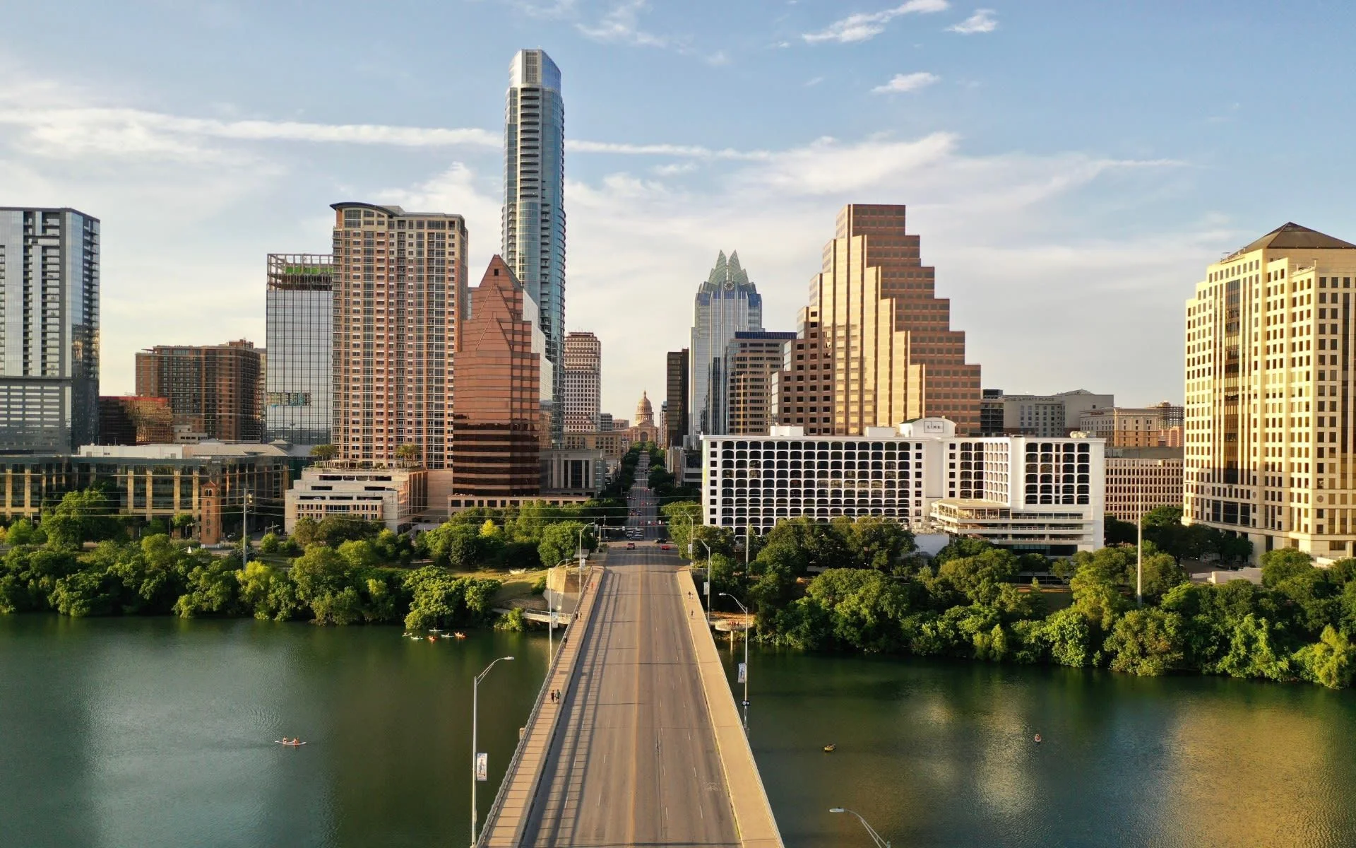 Austin downtown skyline and Congress Avenue Bridge at dusk with Lady Bird Lake