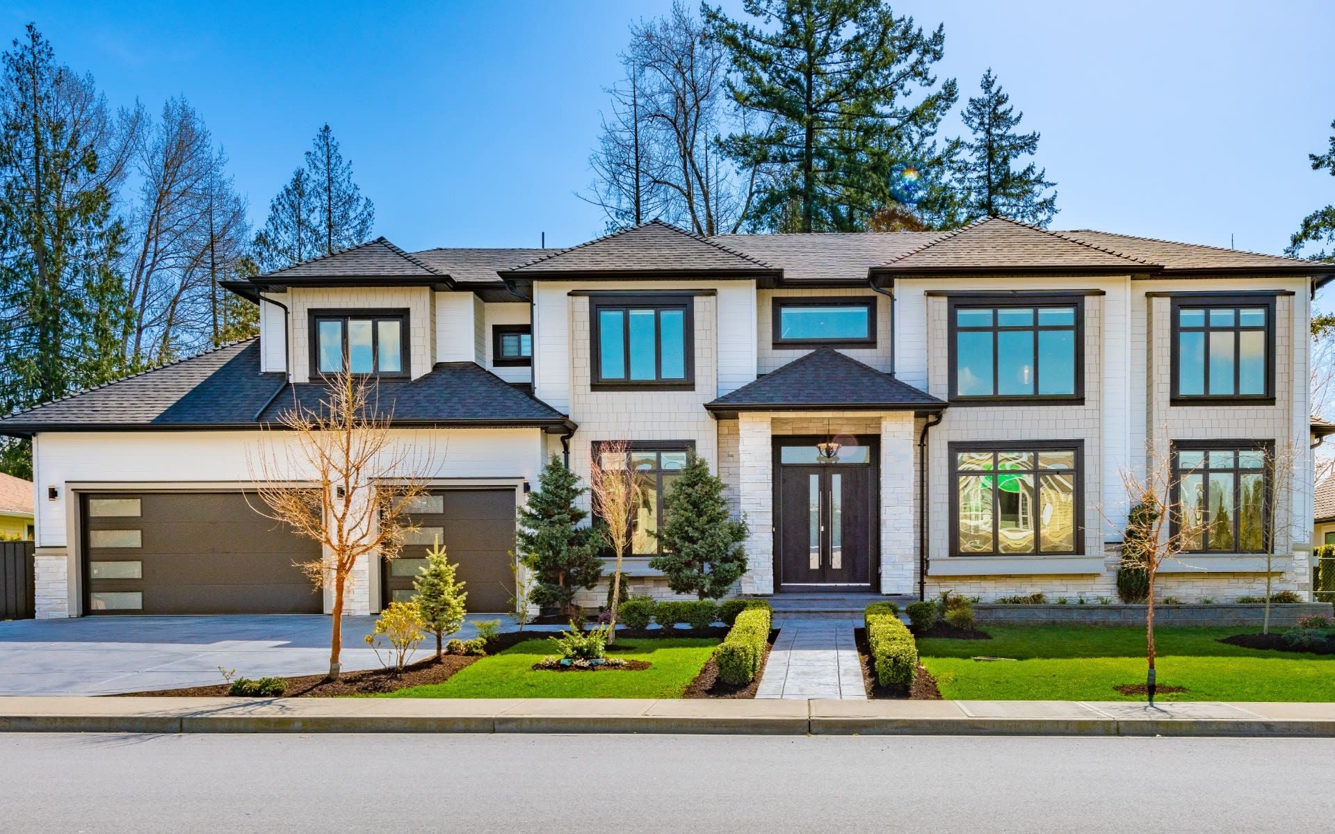 Luxury modern farmhouse exterior representing high-end Northwest Hills market activity