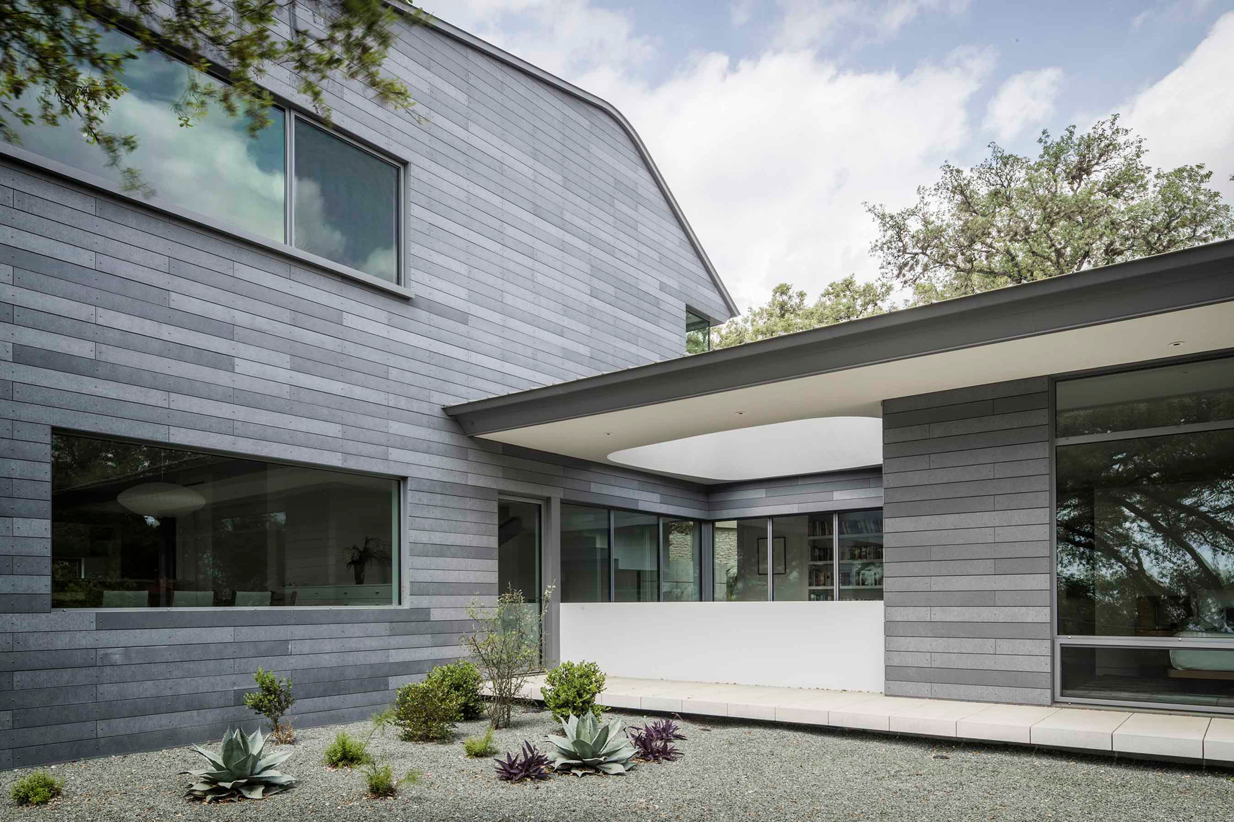 South facade with cantilevered roof profile and Oko Skin cladding