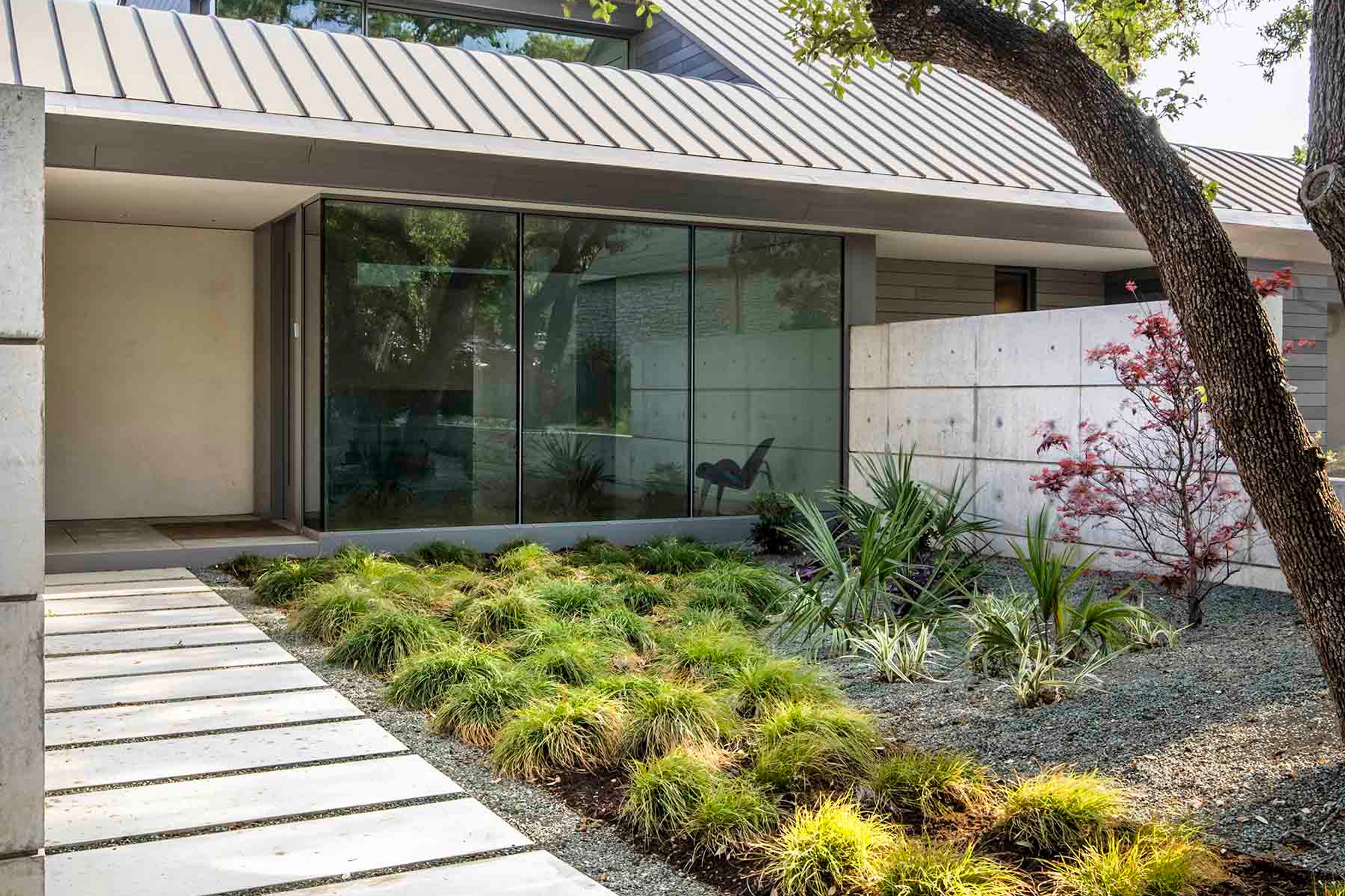 White oak millwork and level 5 drywall with recessed skirting