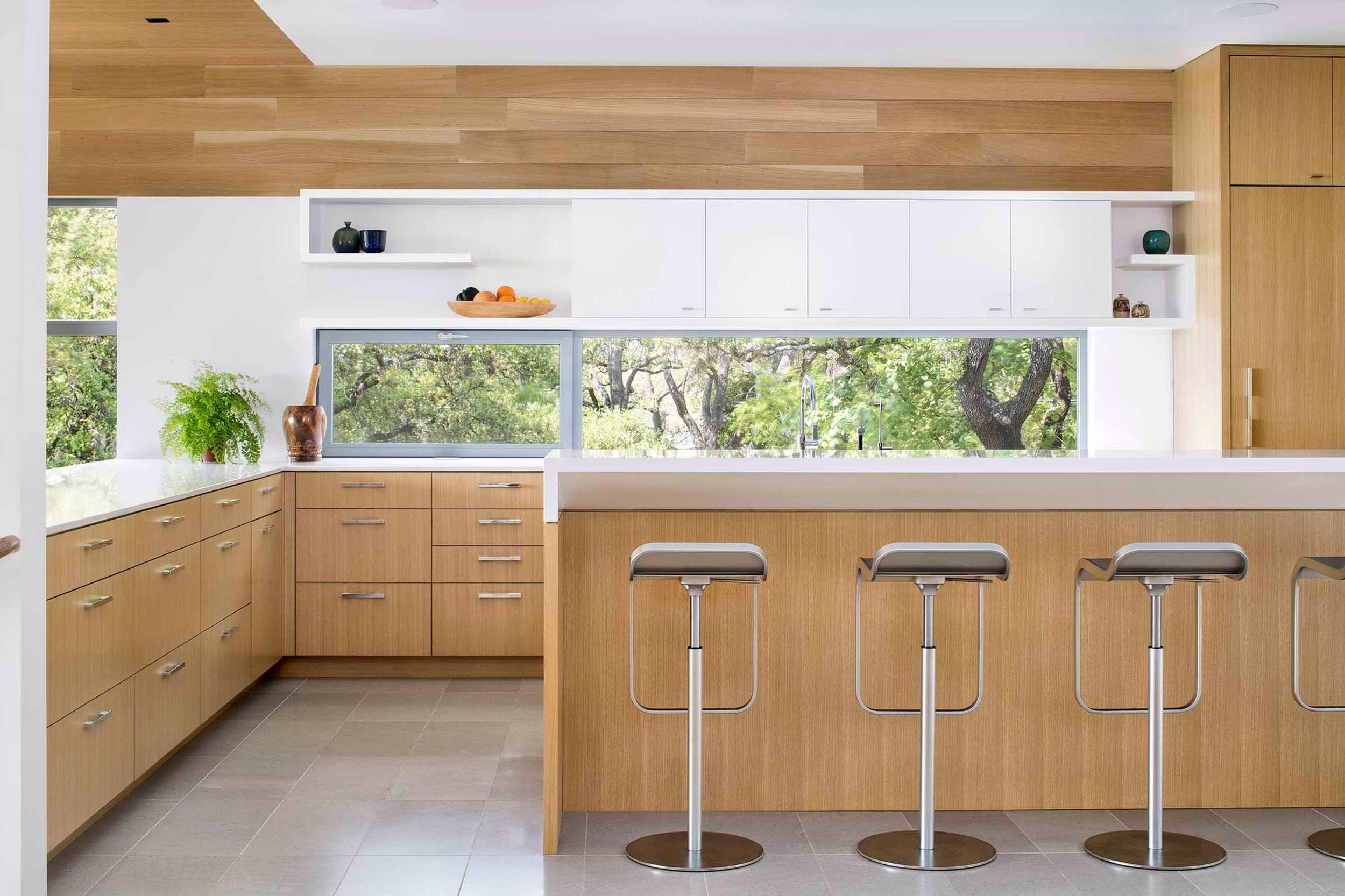 Extended covered balcony off the upper living area