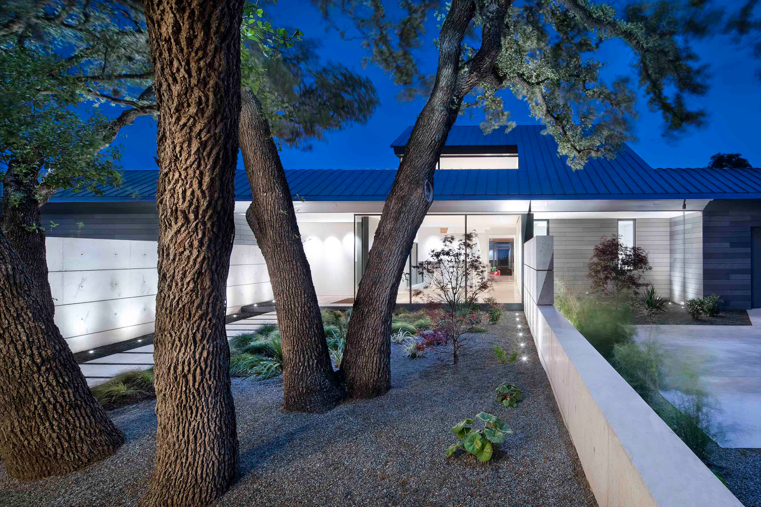 Lower living area with exposed concrete finishes